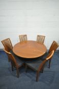 A TEAK DANISH SKOVBY DC06K CIRCULAR DINING TABLE, with an extending mechanism to reveal three pull