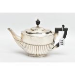 A SILVER TEAPOT, tapered stop reeded design, fitted with a black wooden handle and finial,