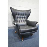 A G PLAN MODEL 6250 BLACK LEATHER WING BACK ARMCHAIR, on rosewood effect legs, on casters,