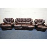 A BROWN LEATHER THREE PIECE SUITE, comprising a three seater settee, and a pair of armchairs