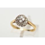 AN 18CT GOLD DIAMOND CLUSTER RING, slightly raised circular cluster ring, set with single cut