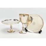 THREE SILVER ITEMS, to include a goblet of a plain polished design with an engraved motif, slight