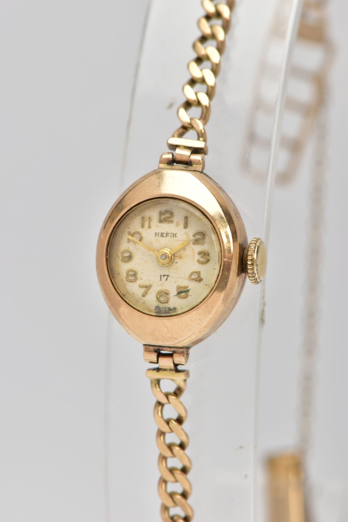 A LADY'S 9CT GOLD WRISTWATCH, a hand wound movement, round discoloured dial signed 'Hefik', Arabic - Bild 2 aus 6