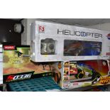A BOXED SYMA RADIO CONTROLLED HELICOPTER, NO.S033G, with a boxed Double Horse radio controlled