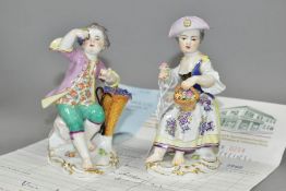 A PAIR OF EARLY 20TH CENTURY MEISSEN FIGURES OF A YOUNG BOY AND GIRL, both seated, the boy holding a