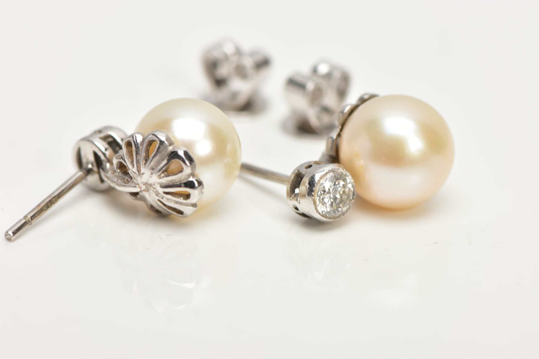 A PAIR OF WHITE METAL DIAMOND AND CULTURED PEARL EARRINGS, each designed with a single cultured - Image 3 of 3