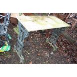 A VICTORIAN CAST IRON GARDEN TABLE with a later marble top width 100cm depth 48cm height 75cm