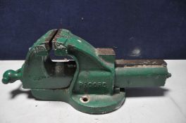 A VINTAGE RECORD No 36P ENGINEERS VICE over painted In green with 6in jaws (condition:- surface rust