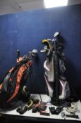 A GOLF CADDY BAG WITH CLUBS to include various Wilson, Taylor Made and King Cobra clubs along with a