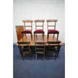 A VICTORIAN WALNUT PULL OUT DINING TABLE, with two additional leaves, on fluted legs, extended