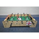 A TABLE TOP FOOSBALL TABLE, length 95cm x max depth 88cm
