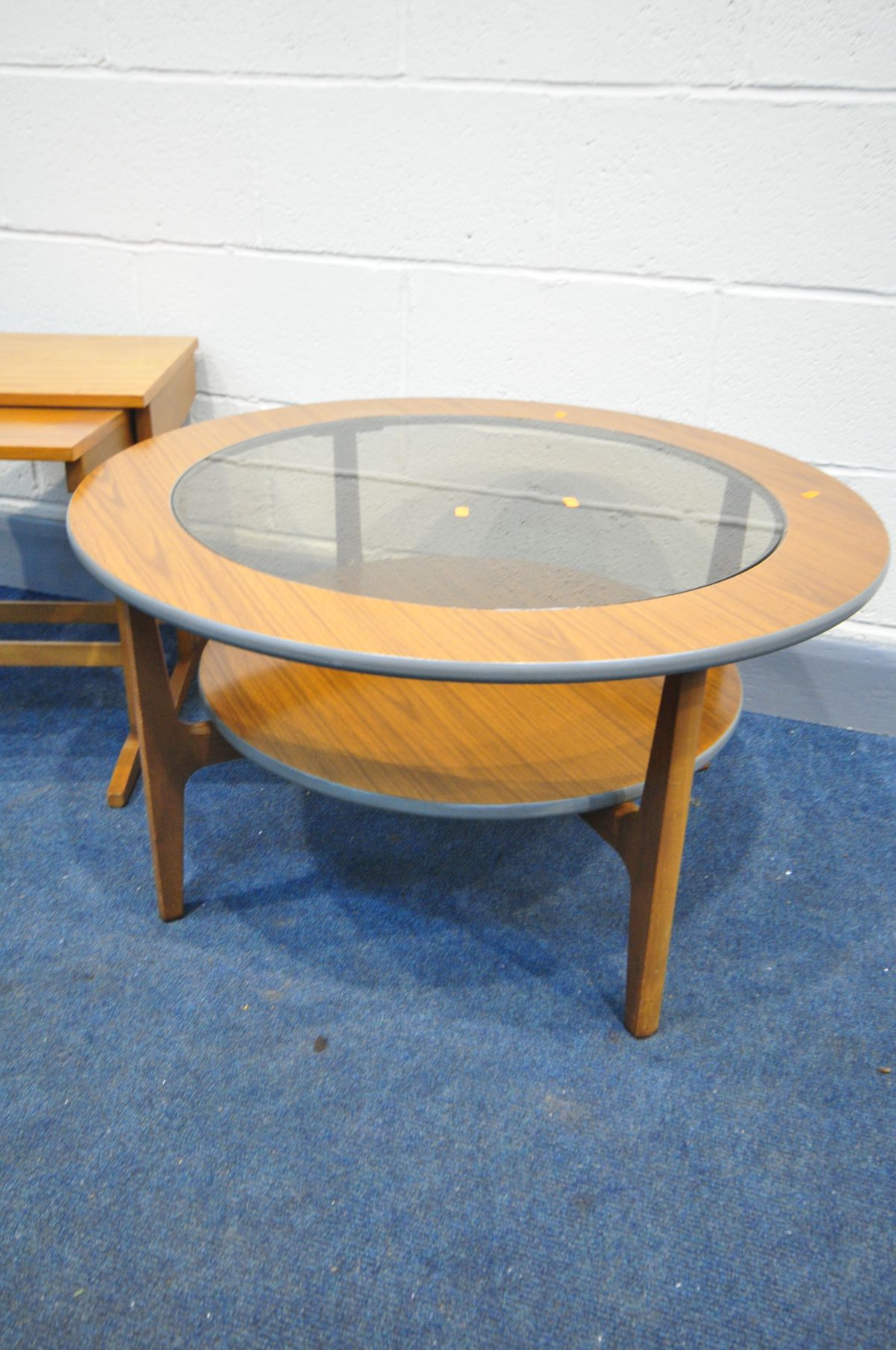 A MID CENTURY TEAK CIRCULAR COFFEE TABLE, with a glass insert, diameter 85cm x height 46cm, and a - Image 2 of 3