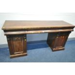 A VICTORIAN MAHOGANY PEDESTAL SIDEBOARD with two short flanking one long ogee shaped drawers to