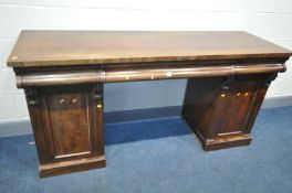 A VICTORIAN MAHOGANY PEDESTAL SIDEBOARD with two short flanking one long ogee shaped drawers to