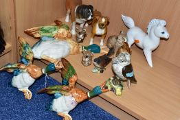 A GROUP OF BESWICK ANIMAL ORNAMENTS INCLUDING THREE BESWICK FLYING MALLARDS, comprising Mallards