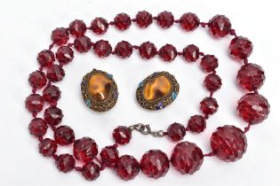 TWO ITEMS OF JEWELLERY, the first a pair of Chinese tiger's eye and enamel clip earrings, length