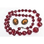 TWO ITEMS OF JEWELLERY, the first a pair of Chinese tiger's eye and enamel clip earrings, length