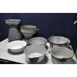 A SELECTION OF STEEL AND ALUMINIUM POTS to include two pairs of aluminium cauldrons, a Thames milk