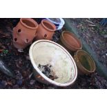 A VINTAGE PANTION 58cm in diameter, two terracotta plant pots and two modern Rhubarb pots (5)