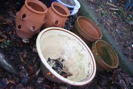 A VINTAGE PANTION 58cm in diameter, two terracotta plant pots and two modern Rhubarb pots (5)