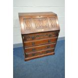 AN OLD CHARM FALL FRONT BUREAU with linen fold detailing to fall front and four drawers below