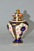 A ROYAL CROWN DERBY IMARI SMALL JAR AND COVER, the jar of inverted baluster form, date code for