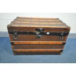A WOODEN AND METAL BANDED STUDDED CANVAS CHEST, width 77cm x depth 47cm x height 50cm