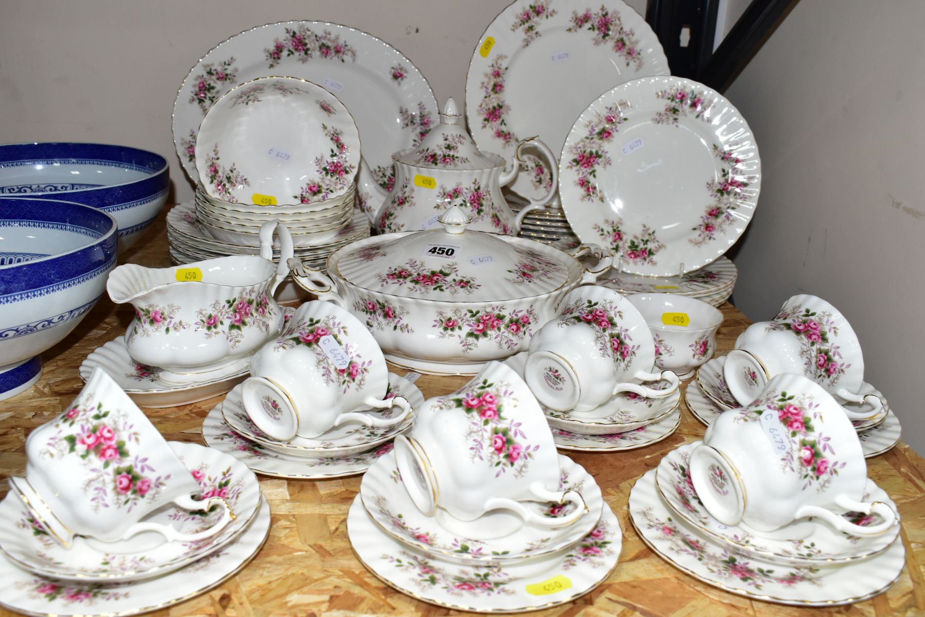 A FIFTY ONE PIECE ROYAL ALBERT LAVENDER ROSE DINNER SERVICE, comprising a teapot, a tureen, a