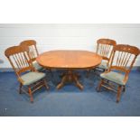 AN OAK OVAL EXTENDING DINING TABLE with four matching chairs, width 152cm x depth 106cm x height