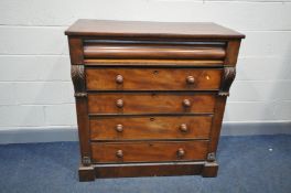 A VICTORIAN SCOTCH CHEST OF FIVE LONG DRAWERS the top one being shaped with turned handles and