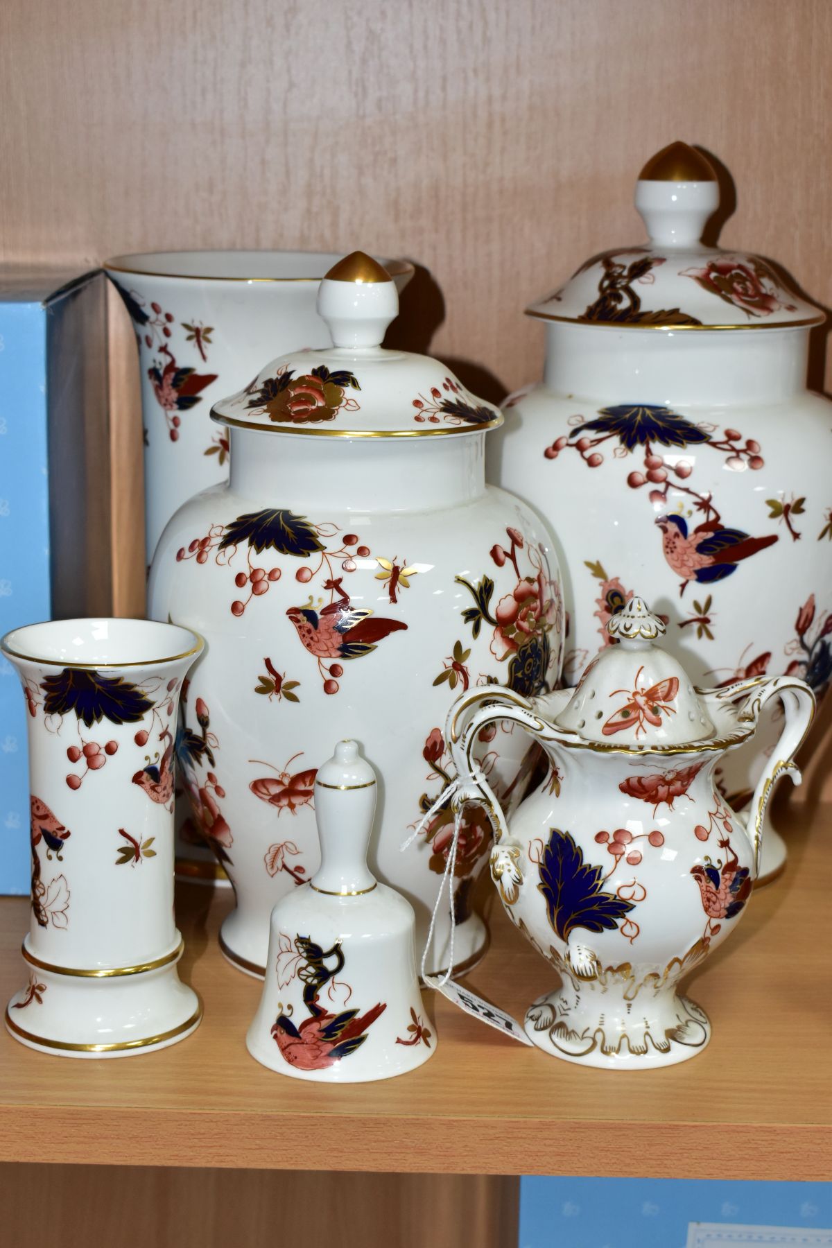 SIX PIECES OF COALPORT HONG KONG CERAMIC WARES, comprising two covered vases heights approximately