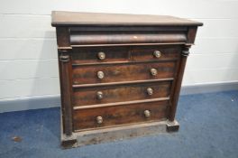 A VICTORIAN SCOTTISH CHEST OF DRAWERS with book matched mahogany drawer fronts one ogee shaped