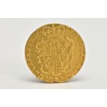 A GEORGE III GOLD GUINEA THIRD HEAD 1769, NICK AT 6 O' CLOCK REVERSE