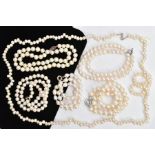 SIX BAROQUE CULTURED PEARL NECKLACES, to include six white single strand necklaces, approximate