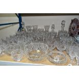 A QUANTITY OF CUT GLASS AND CRYSTAL ITEMS, approximately seventy five pieces to include a ships