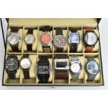 A WATCH DISPLAY CASE WITH WRISTWATCHES, black display case with a perspex lid, contains twelve watch