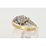 A SINGLE STONE DIAMOND RING, the brilliant cut diamond within a raised star illusion setting,