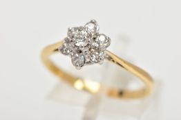 AN OLD CUT DIAMOND CLUSTER RING, a seven stone diamond cluster, claw set to tapering chenier