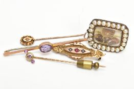 A SELECTION OF EARLY 20TH CENTURY BROOCHES AND PINS, to include a yellow metal brooch set with one