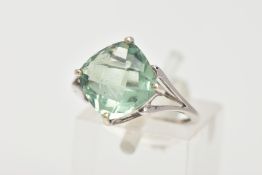 A MODERN 9CT WHITE GOLD COATED TOPAZ DRESS RING, a square faceted topaz, assessed as coated, claw