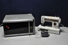 A ONN OM004 900W MICROWAVE and a Frister Rossmann Beaver2 sewing machine with foot pedal (both PAT