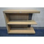 A LOW WINSOR TIBRO OAK FEATURE BOOKCASE, comprising of two open shelves, new and unused condition,