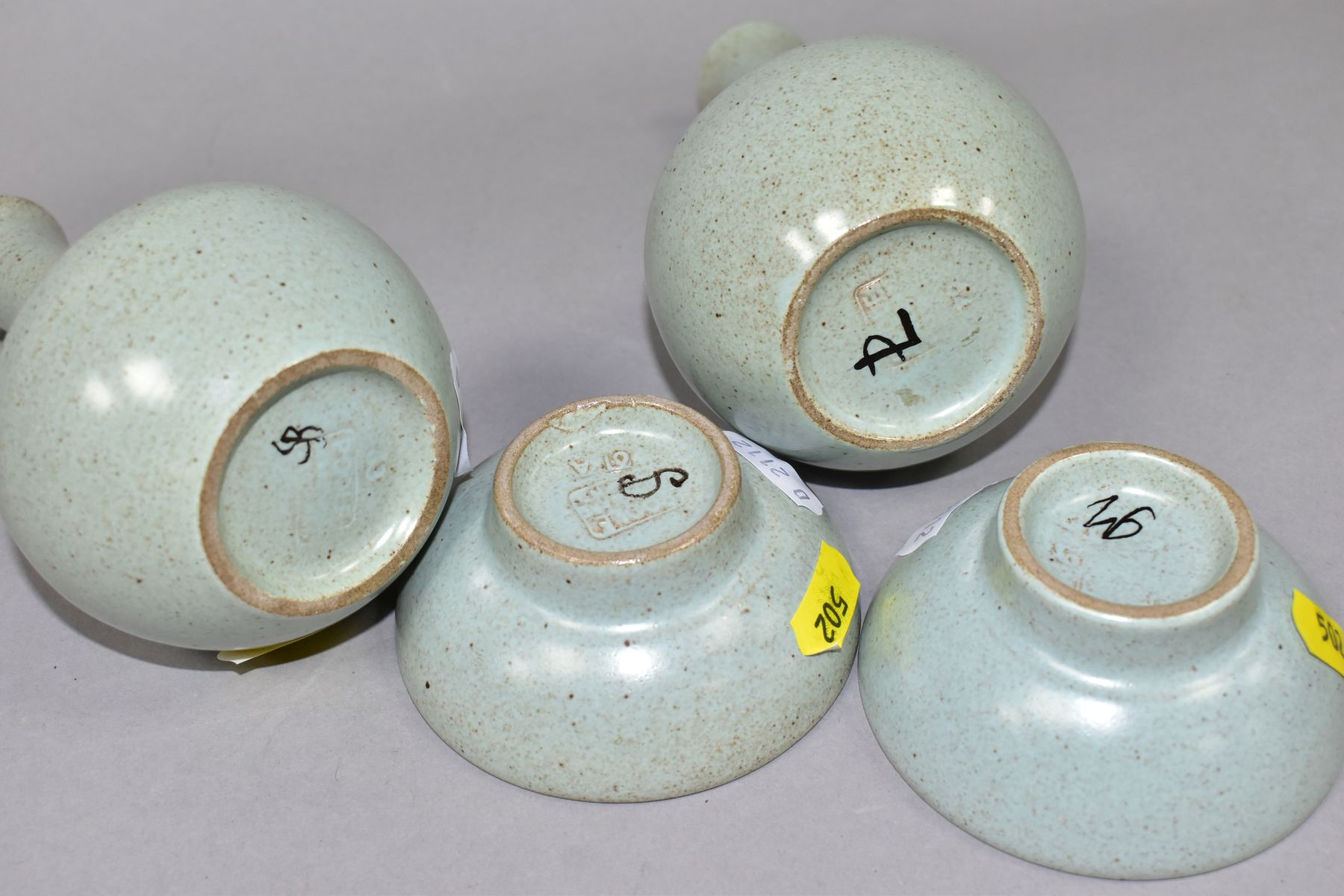 FOUR PIECES OF POOLE POTTERY, comprising two vases and two small dishes, mottled pale green ground - Image 4 of 4