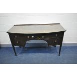 AN EDWARDIAN MAHOGANY BOWFRONT SIDEBOARD with herringbone stringing to door, drawer front and top,