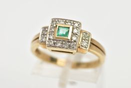 AN EMERALD AND DIAMOND RING, a square cut emerald with a surround of twelve diamonds, flanked by