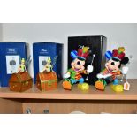 FOUR ENESCO DISNEY SHOWCASE COLLECTION FIGURES/MONEYBANKS, comprising two Disney Britto Band