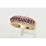 A 9CT GOLD RUBY AND DIAMOND RING, ten circular cut rubies claw set with grain set round brilliant