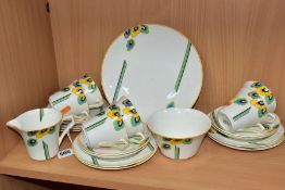A TWENTY ONE PIECE ART DECO PALISSY TEASET with geometric floral printed pattern and angular