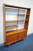 A MID CENTURY DANISH STYLE TEAK ROOM DIVIDER/BOOKCASE, with double sliding doors, width 123cm x