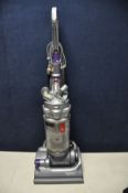 A DYSON DC 14 UPRIGHT VACUUM CLEANER with all attachments (PAT pass and working)